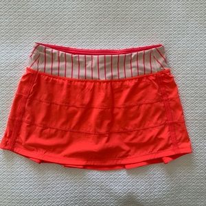 Lululemon Pace Rival bright orange skirt